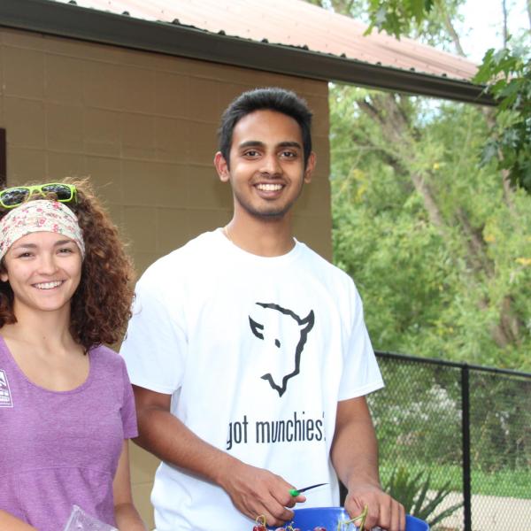 Two BFIS members under picnic shelter