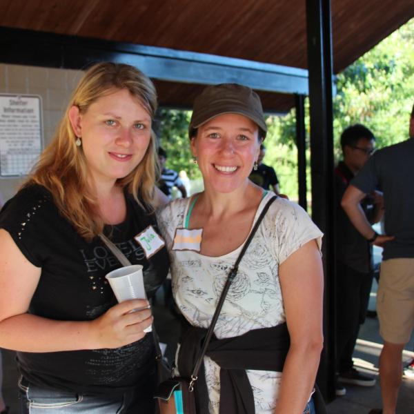 Two BFIS members under picnic shelter