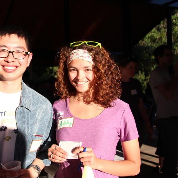 Two BFIS members smiling in the sun