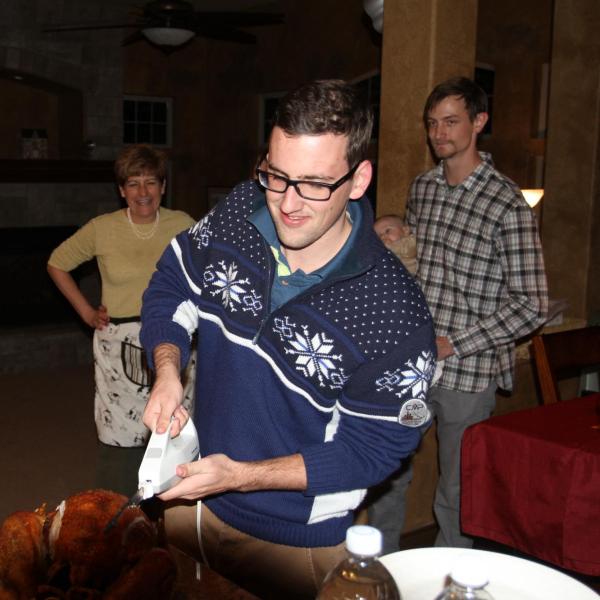 Student carving turkey