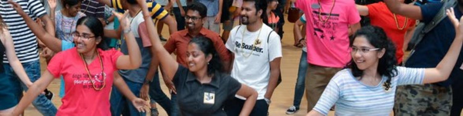 Students in a large line dancing