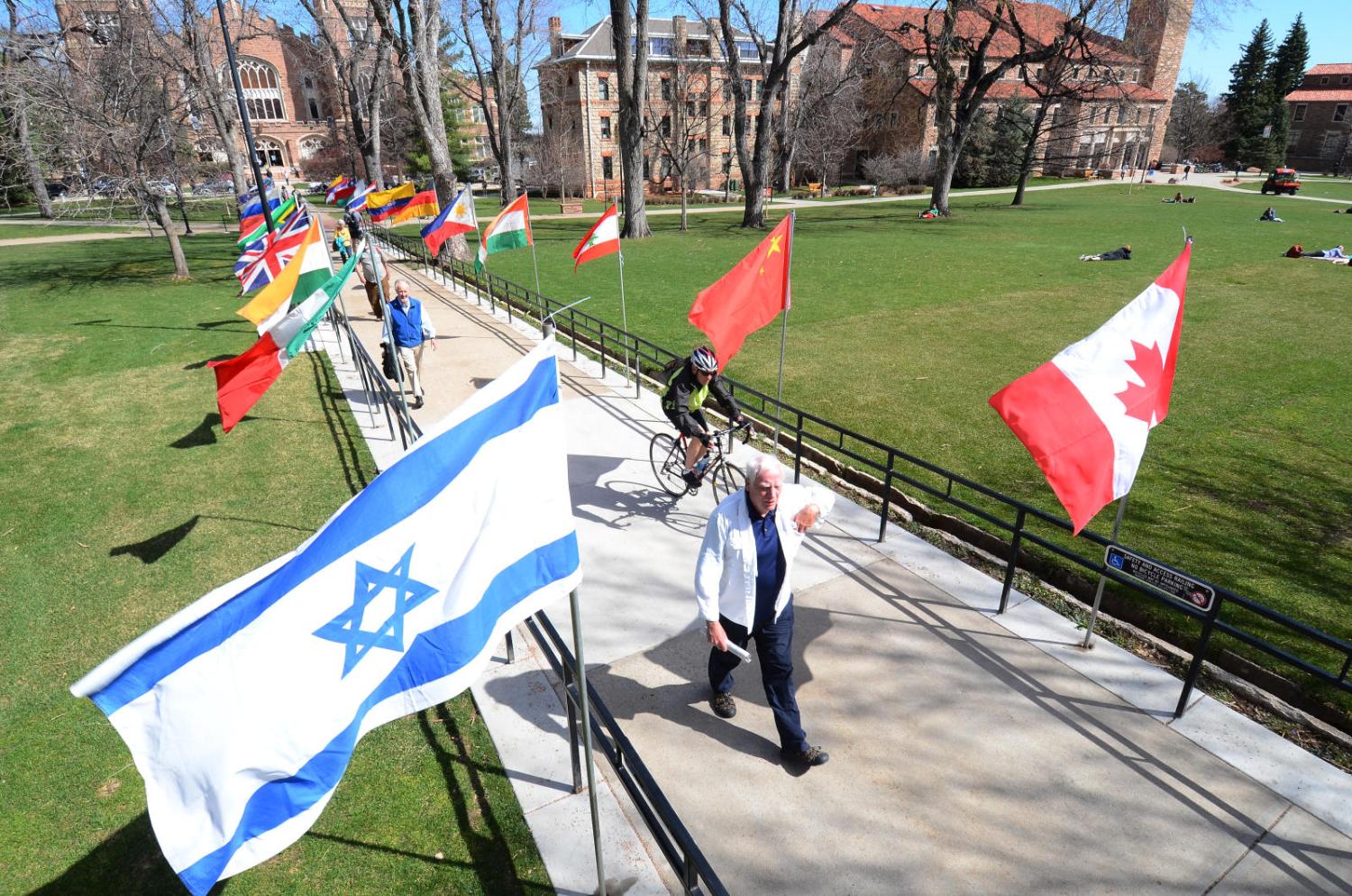 walkway flanked by international flags