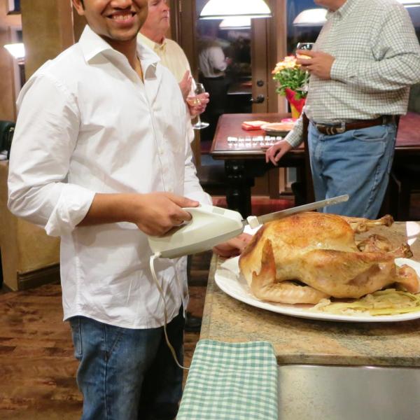 Student carving a turkey