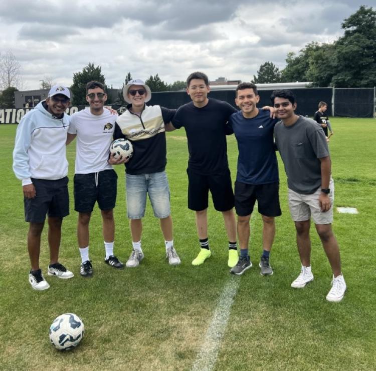 Six students at soccer field who competed in soccer competition