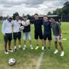 Six students at soccer field who competed in soccer competition