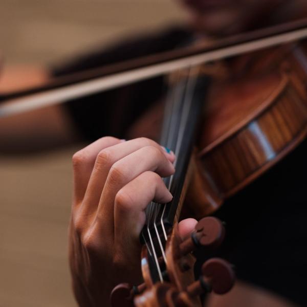 Person playing a violin