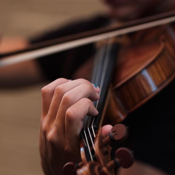 Person playing a violin 