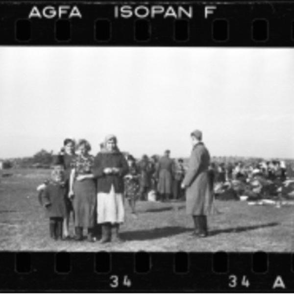 Women and children before a mass shooting by police officers in Lubny