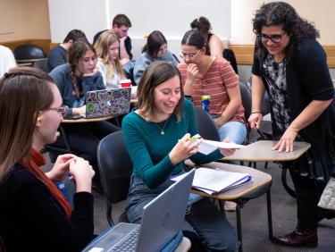 Students and professor engaging in classroom