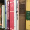 Photo of books on a shelf from the Post-Holocaust American Judaism Collections, Richard Campbell Collection