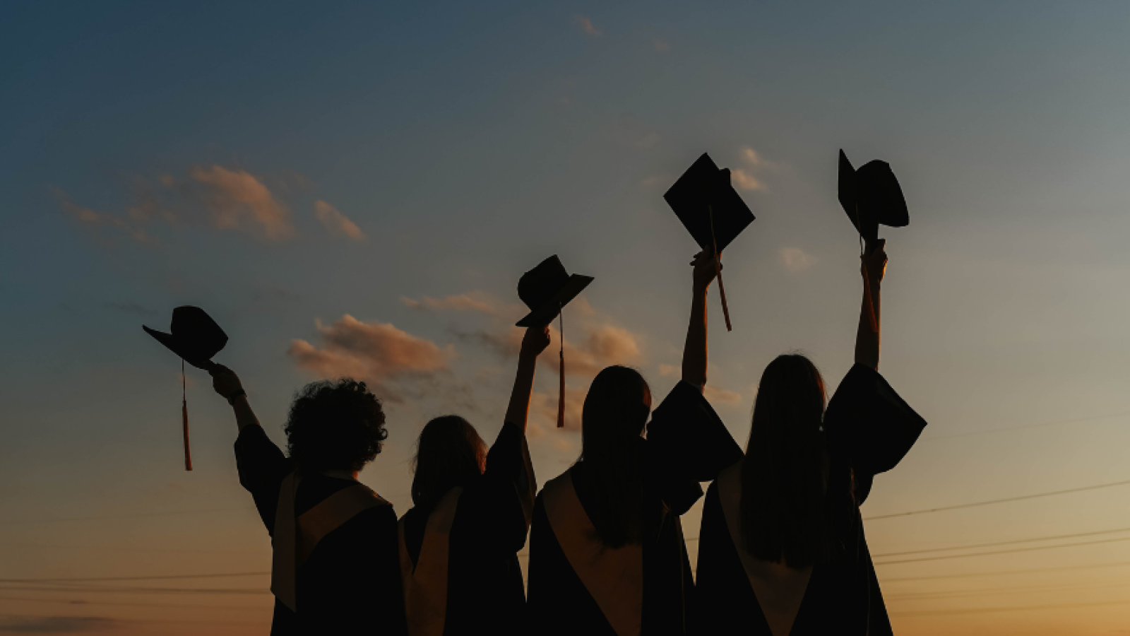 Silhouettes of graduating students