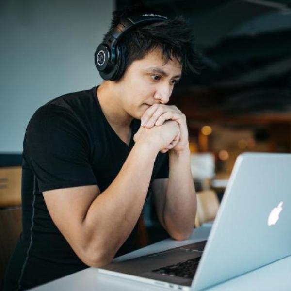 Person Writing on Computer