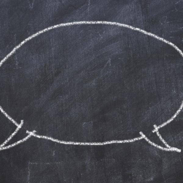 speech bubble on chalkboard