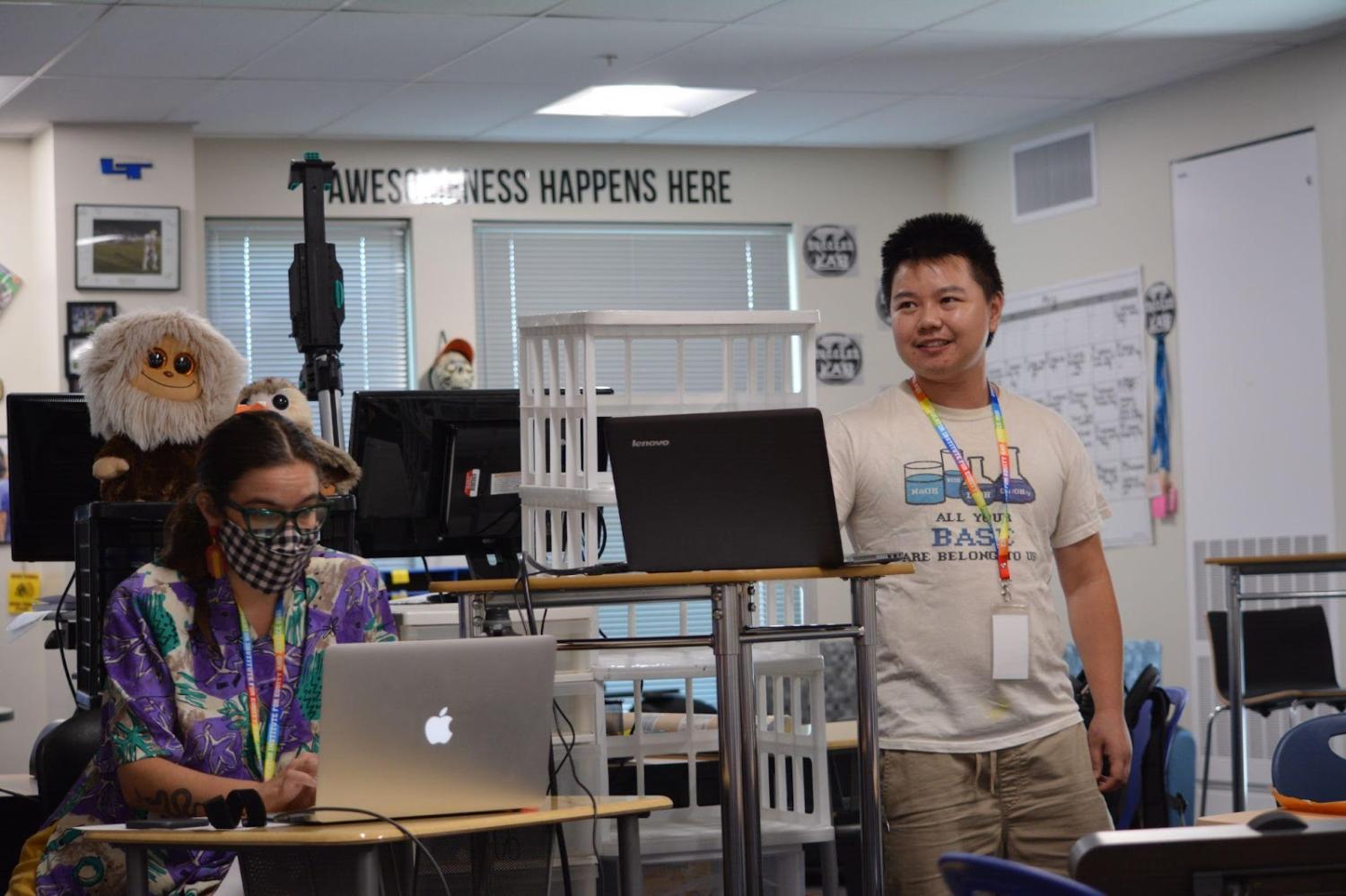 Kachine supporting a presenter, Sam Long, in a session on Saturday of the institute