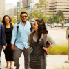Manuel Espinoza walking with his students outside the Students Commons Building