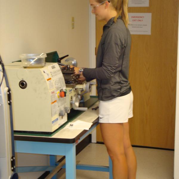 Madie fabricating a mobile crawler device for surgical applications.