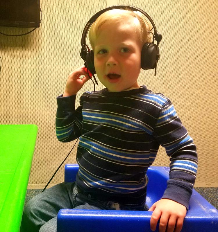 child with headphones