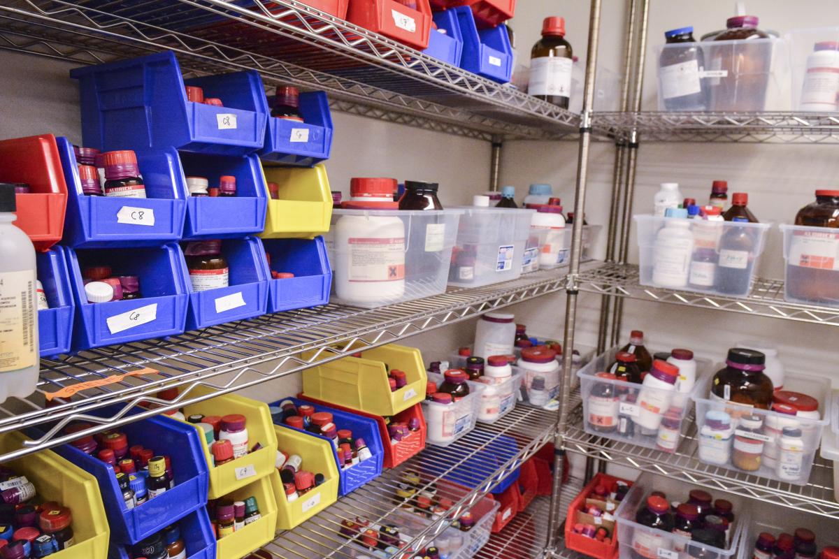 Chemicals in tubs on shelves