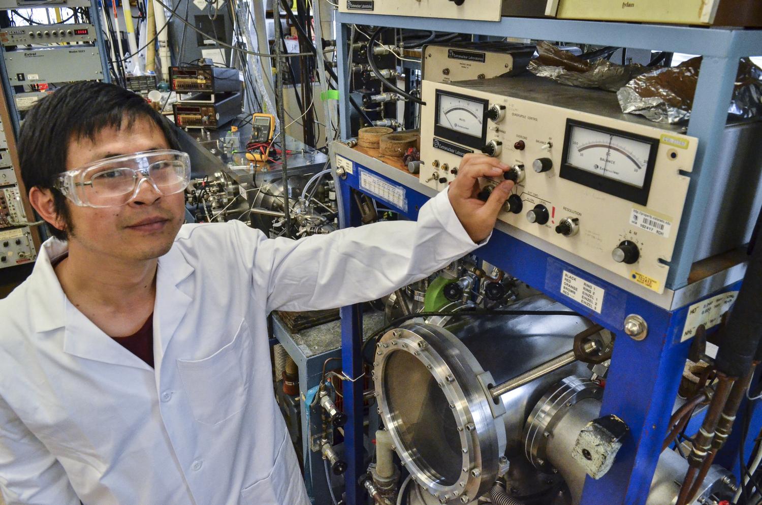 Graduate Student working at the Afterglow machine.