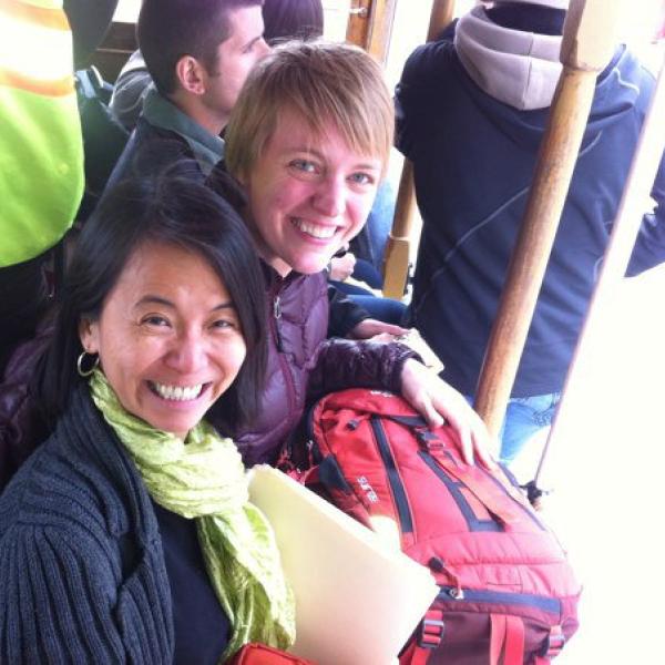 Journal to Data Collection: Ellie & Pui Fong taking the cable car to Kai Ming Head Start. 