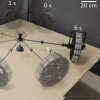 Motion sequence of the electrohydraulic rolling soft wheel around a pivot on a square platform