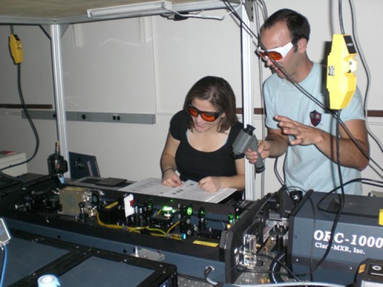 Group members Mirv and Josh working in the lab