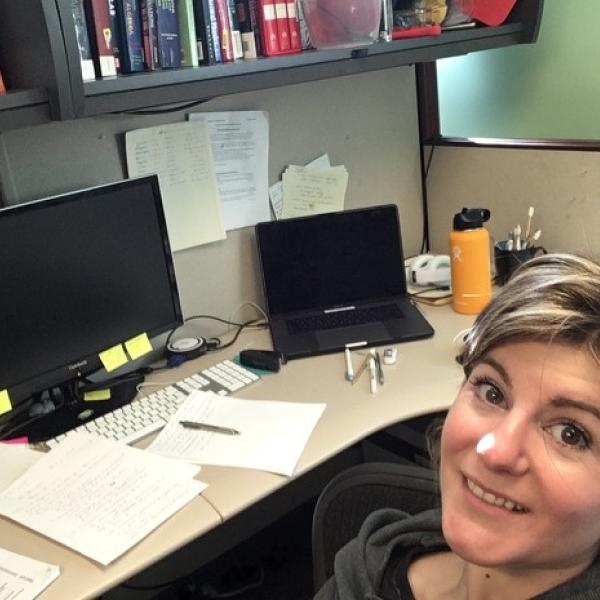 Kori at her desk
