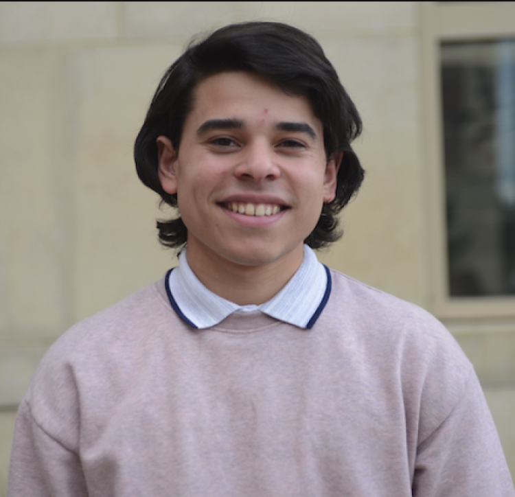 A professional headshot of Jesús