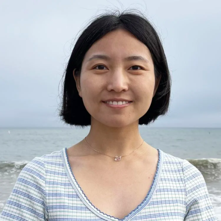 A professional headshot of Yaran