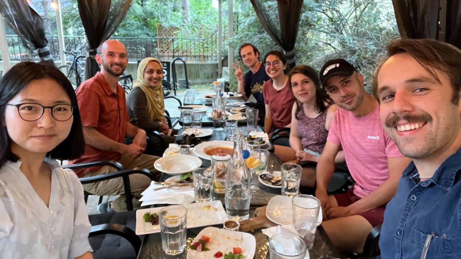 A group photo at Nate and Ana's goodbye event