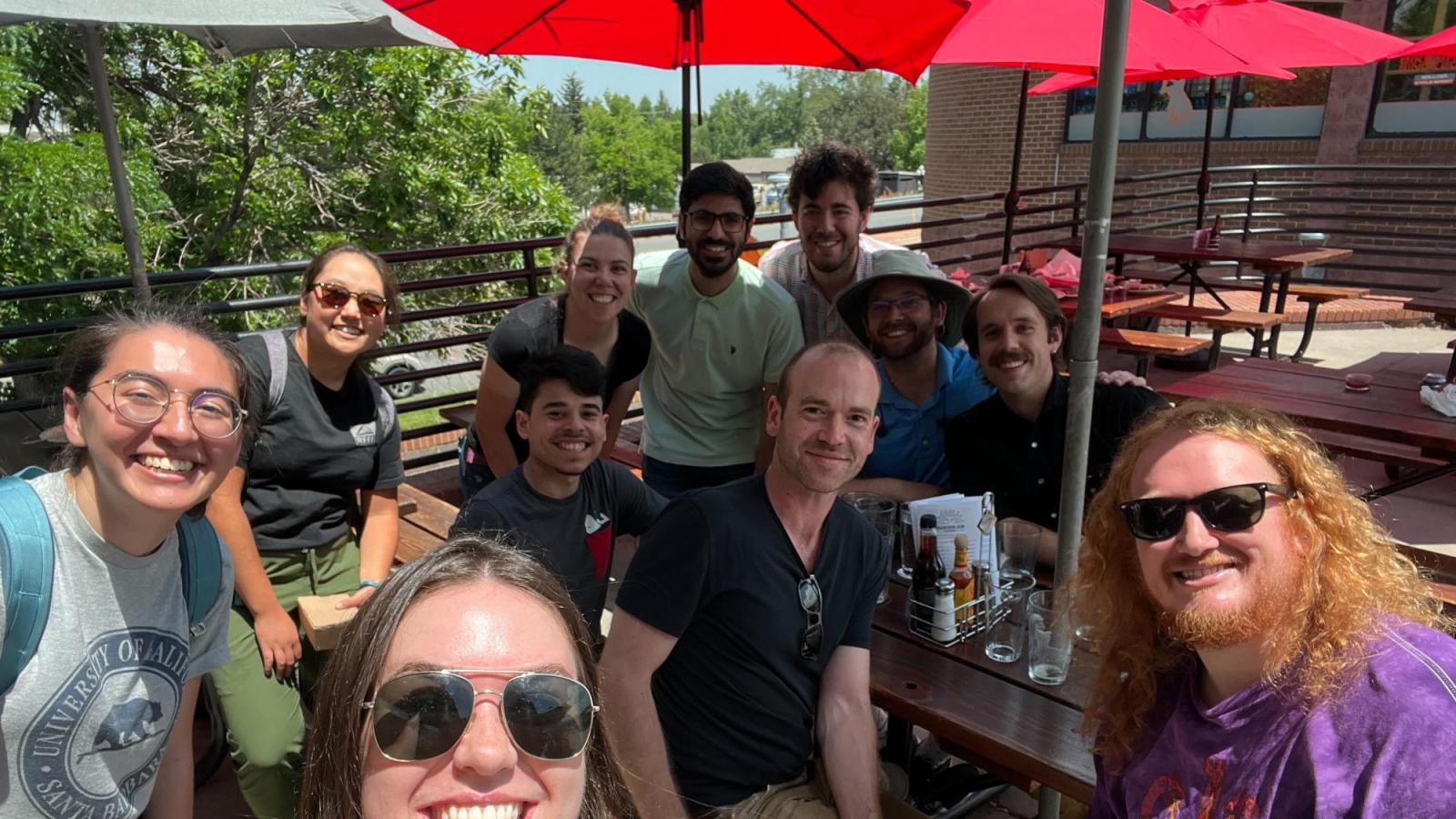 A group photo at Carlos' goodbye event in Summer 2023