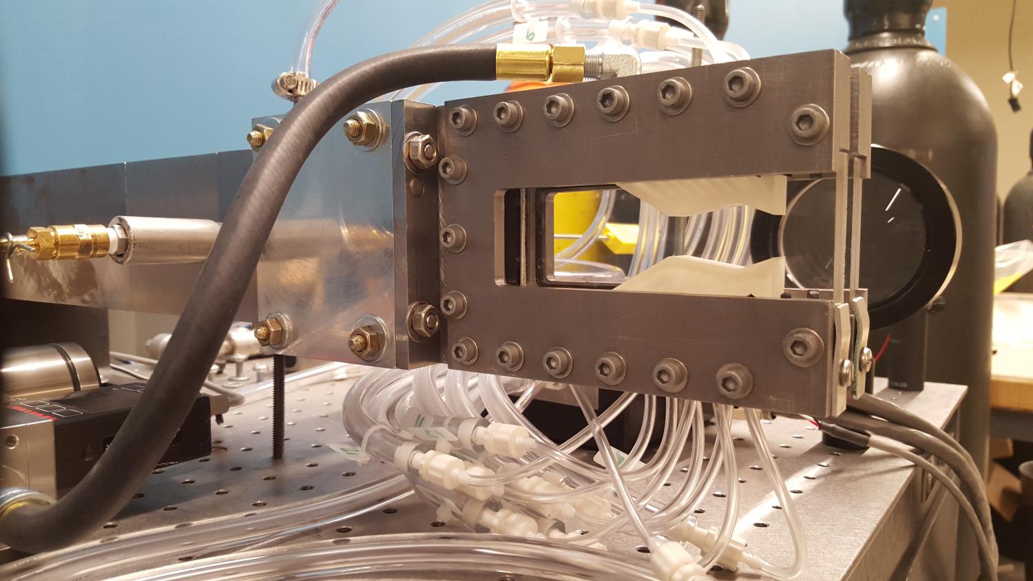Close-up photograph of the dual-throat nozzle assembly.