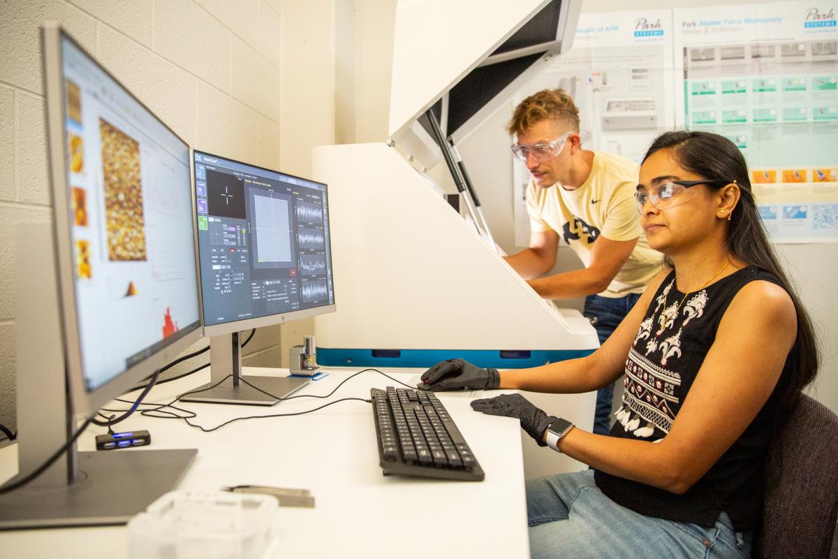 Neha Mahuli & Marcel Junige at the AFM; Atomic Force Microscope