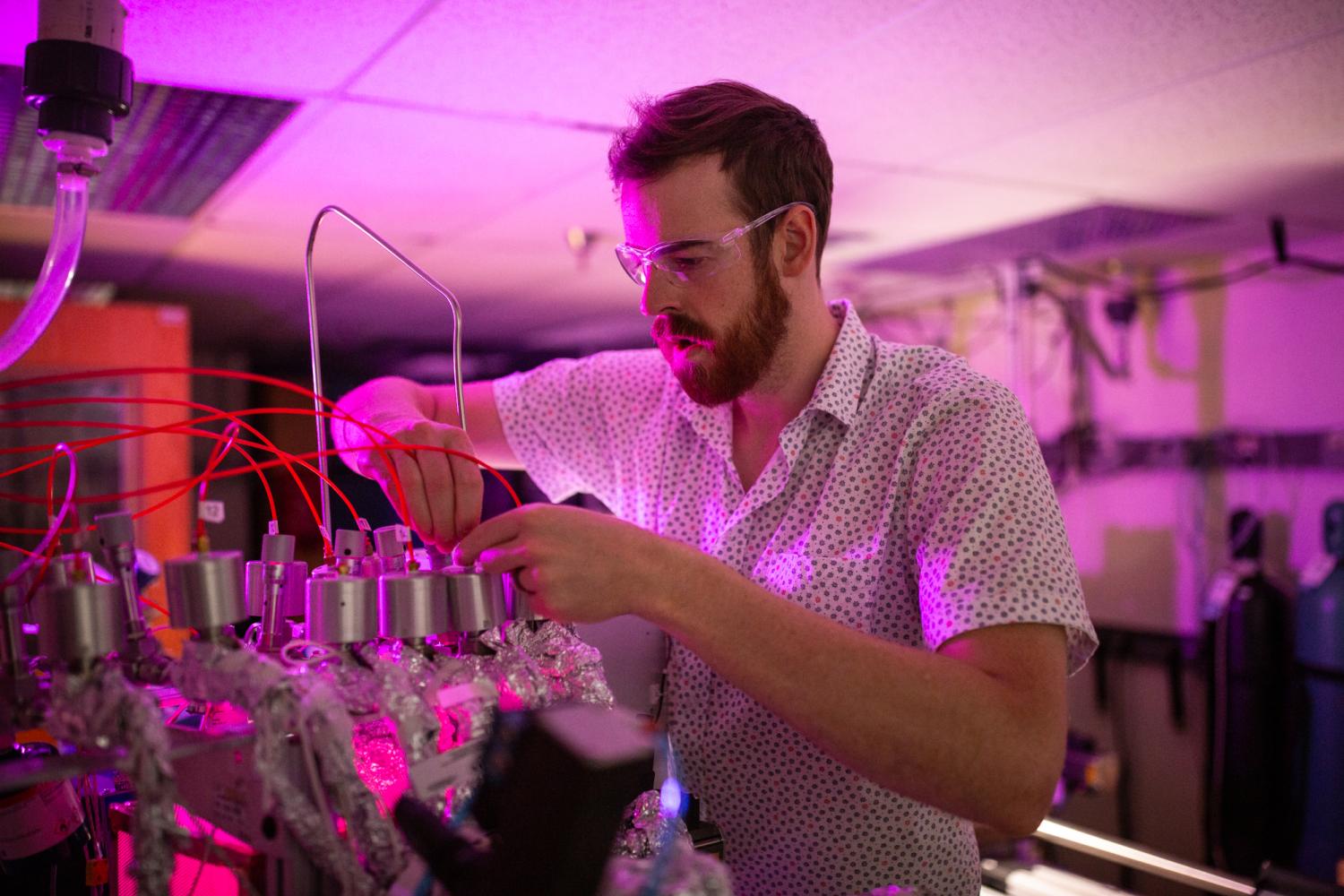 Brian Welch in the Laboratory with Roll-to-Roll MLD; University of Colorado at Boulder, Steven M. George Research Group