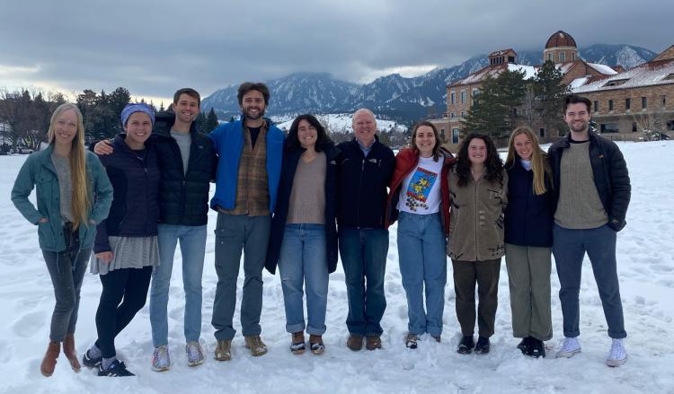 Group photo of the lab in front of the Boulder Flatirons