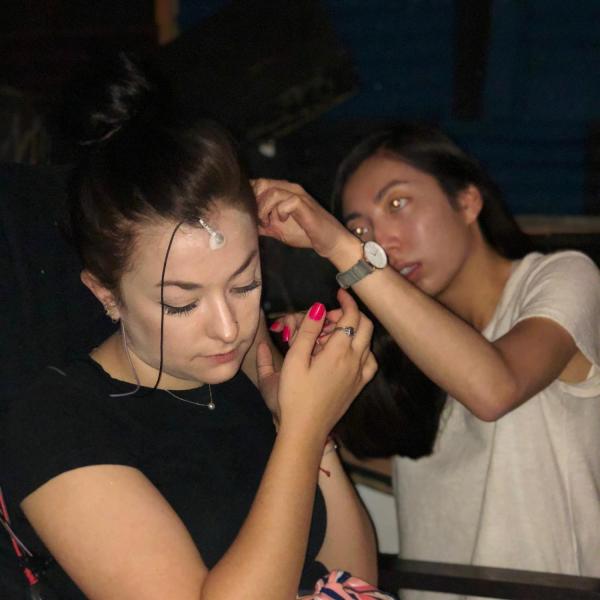 Amy Sanders placing ABR electrodes on subject's head