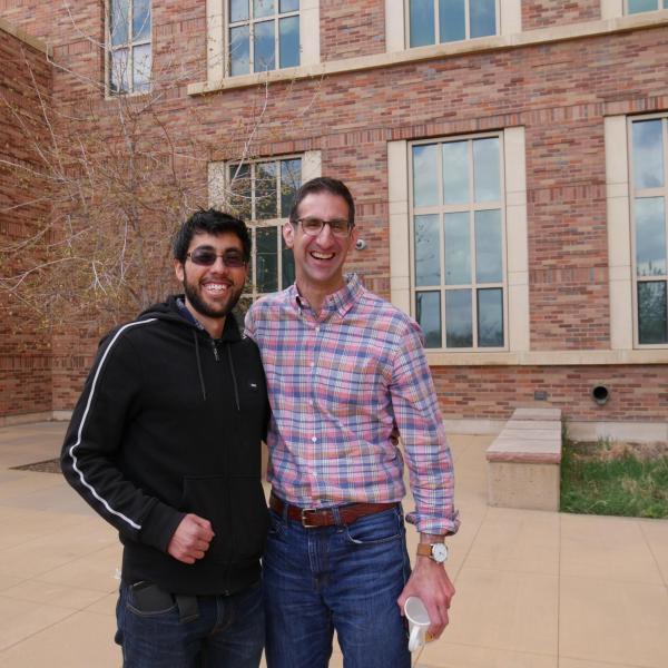 Joel and Andres celebrating Andres' PhD.