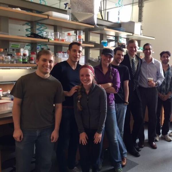 Congratulating Erik in the lab after passing his defense!