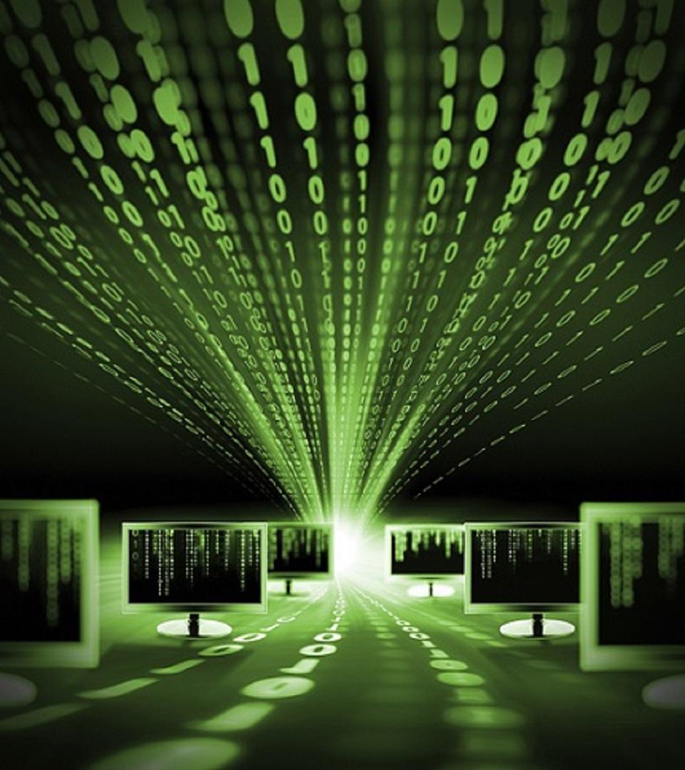 image of computers with binary code floating above