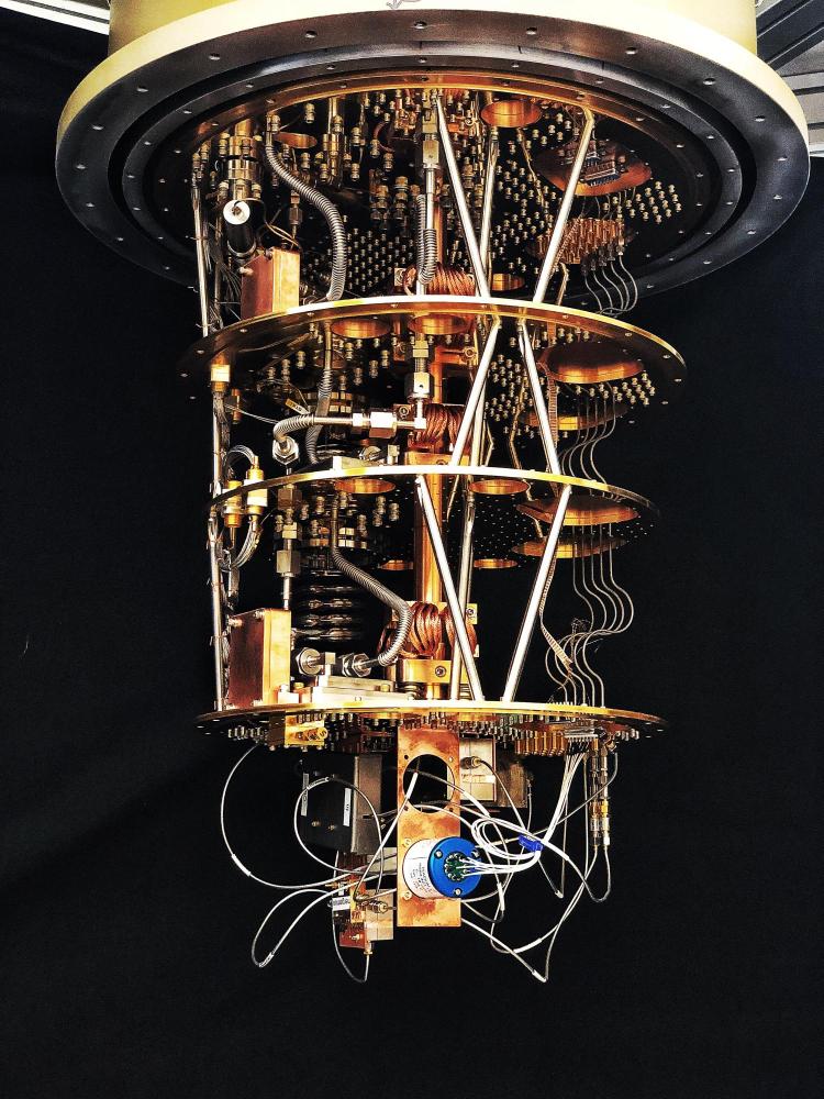 Gold-plated FormFactor dilution refrigerator chadelier with microwave components and SMA wiring installed.