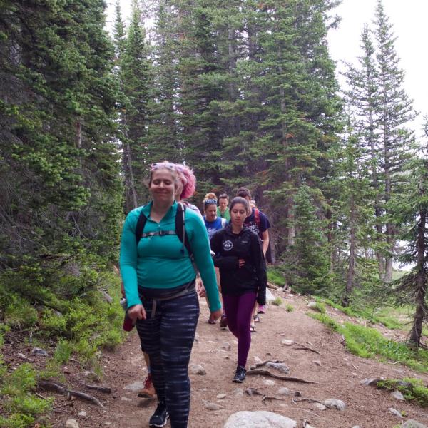Kate smiling on the trail
