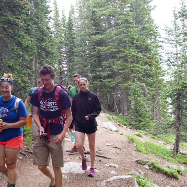 Nicole and tiffany and tashi on the trail