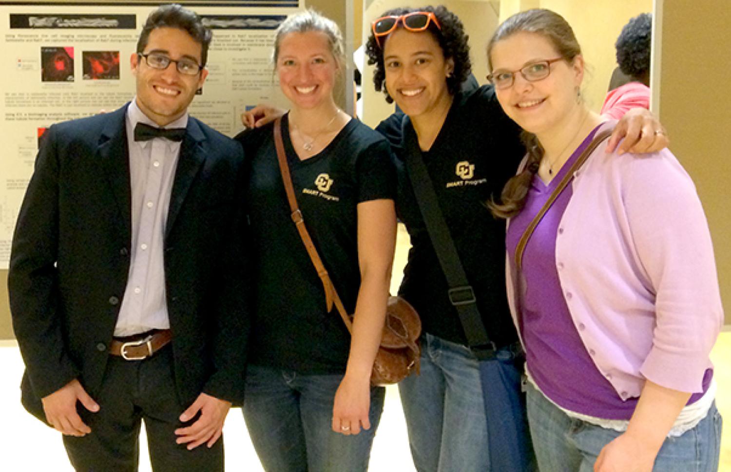 Mateo with Ali, Sarah, and Esther at his poster session.