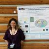 Lara with her poster
