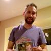 Kyle with his Crazy Cat Lady white elephant gift.