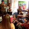 Amy explaining the rules to the white elephant gift exchange.