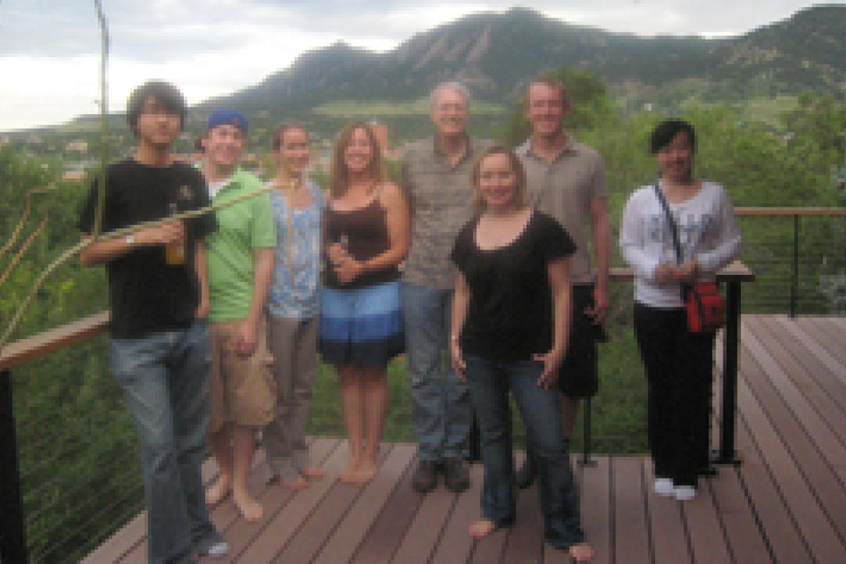 Group posed on deck outside