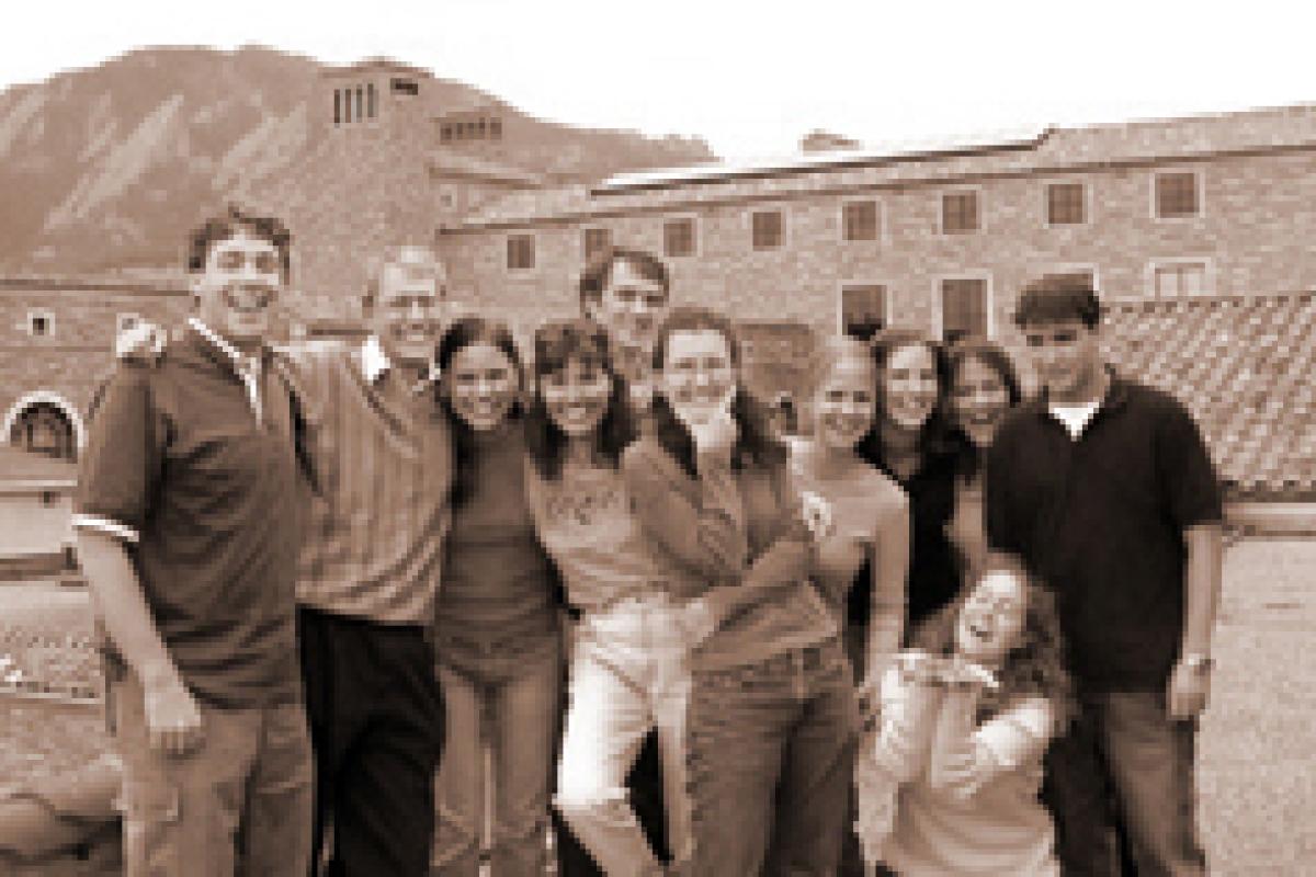 Past group posed together on campus