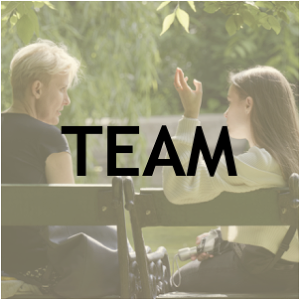 Two people talking, "TEAM"