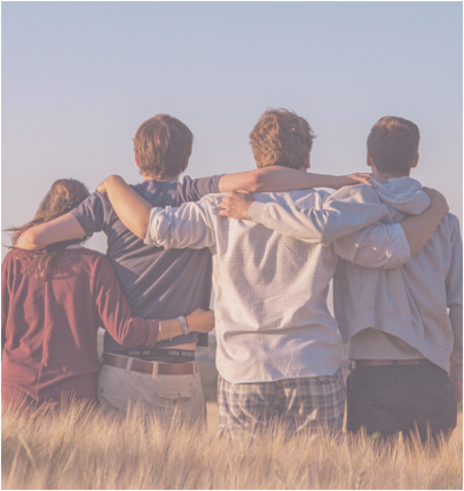 Group of teens hugging